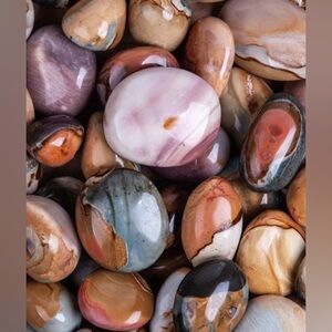 One Polychrome Jasper Crystal Palm Stone